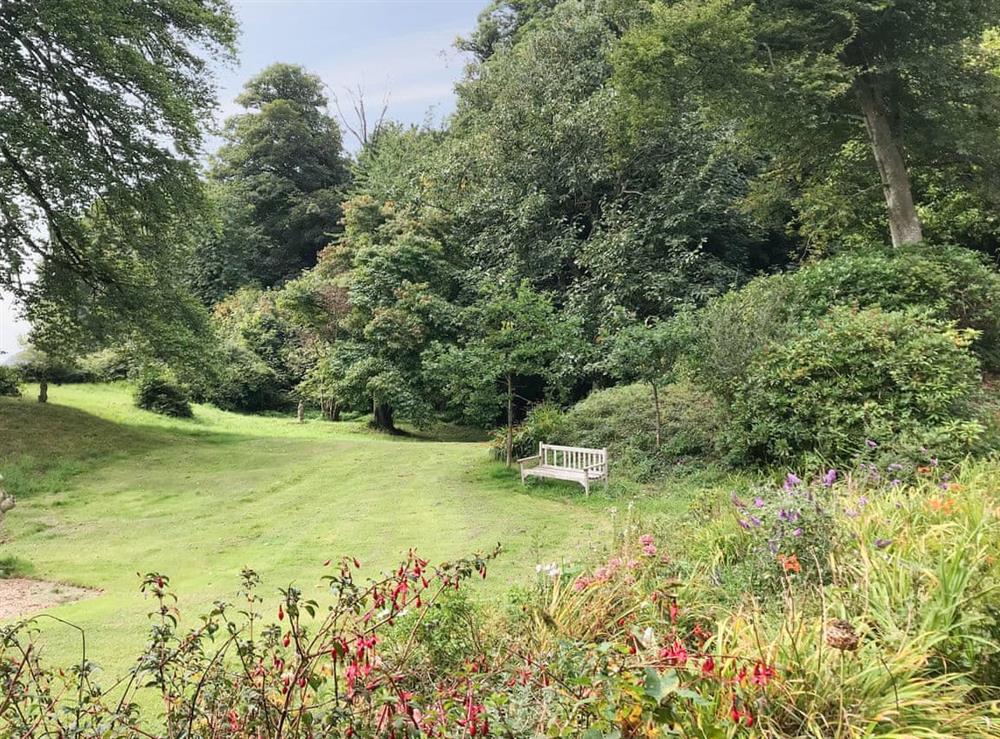 Well-maintained gardens at Castle Hill House in Sidbury, near Sidmouth, Devon