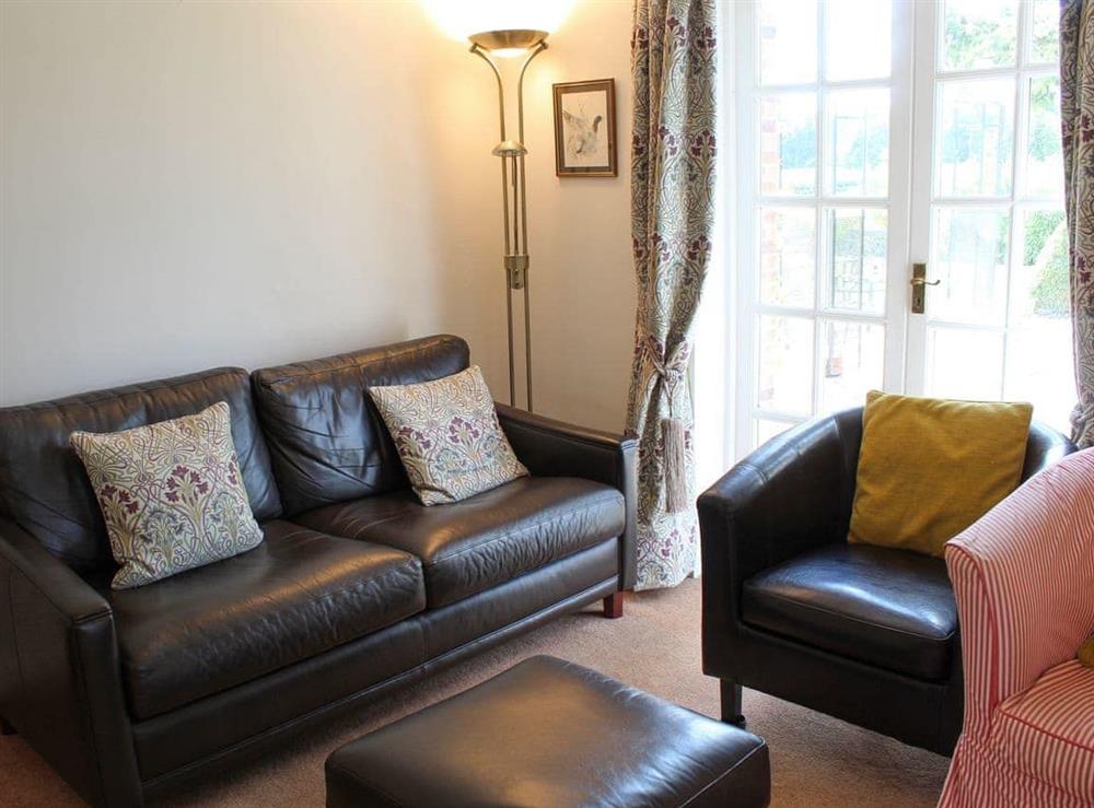 Living room at Castle House Cottage in Horton, near Wimborne, Dorset