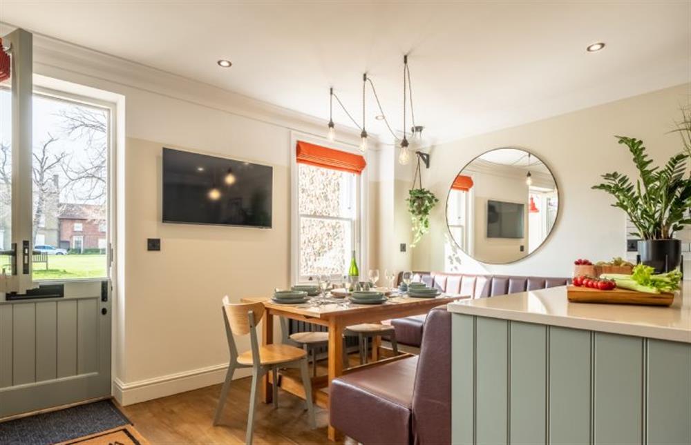 Castle House: As you enter the property the dining area with a large banquette is on your left.  at Castle House, Wells-next-the-Sea