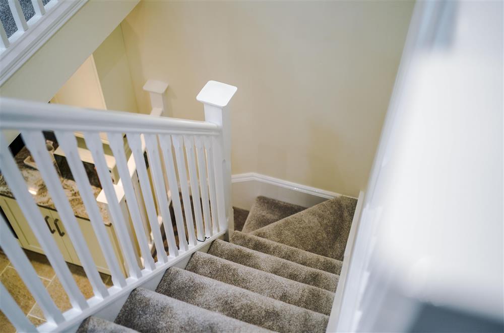 The stairs leading up to the first floor