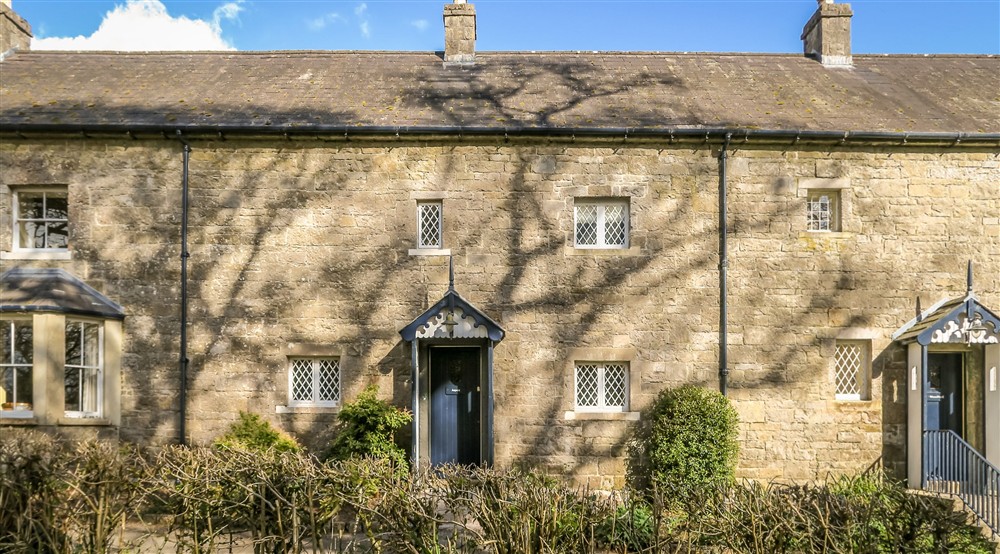 The exterior of Aspen Cottage, County Fermanagh at Castle Ward Bunkhouse in Downpatrick, County Down
