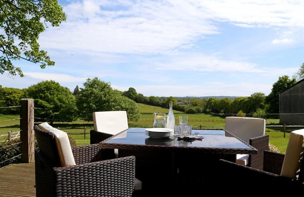 Outdoor seating and the views at Castlemans Stables East, Sedlescombe, Nr Battle