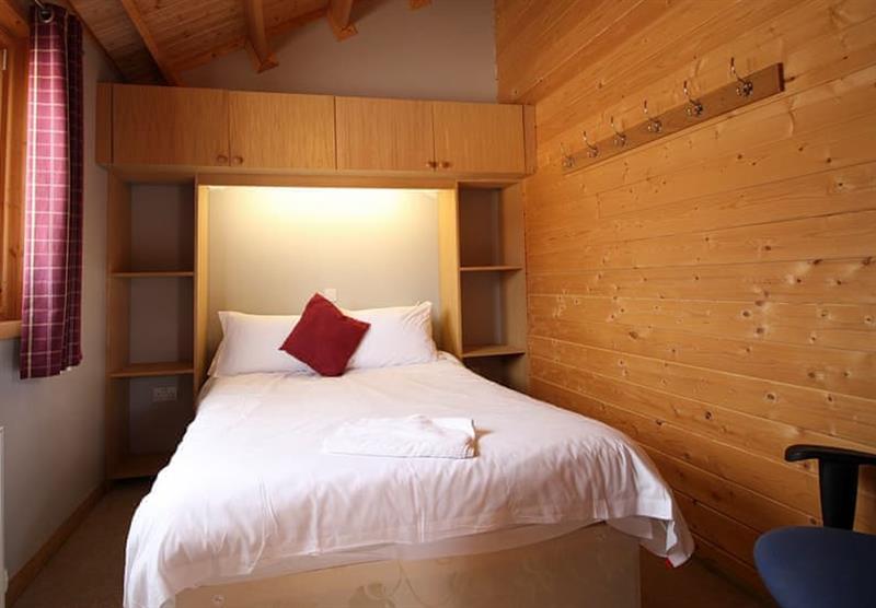A double bedroom in the Yew at Castlewood Lodges in Castlewood, Strachan