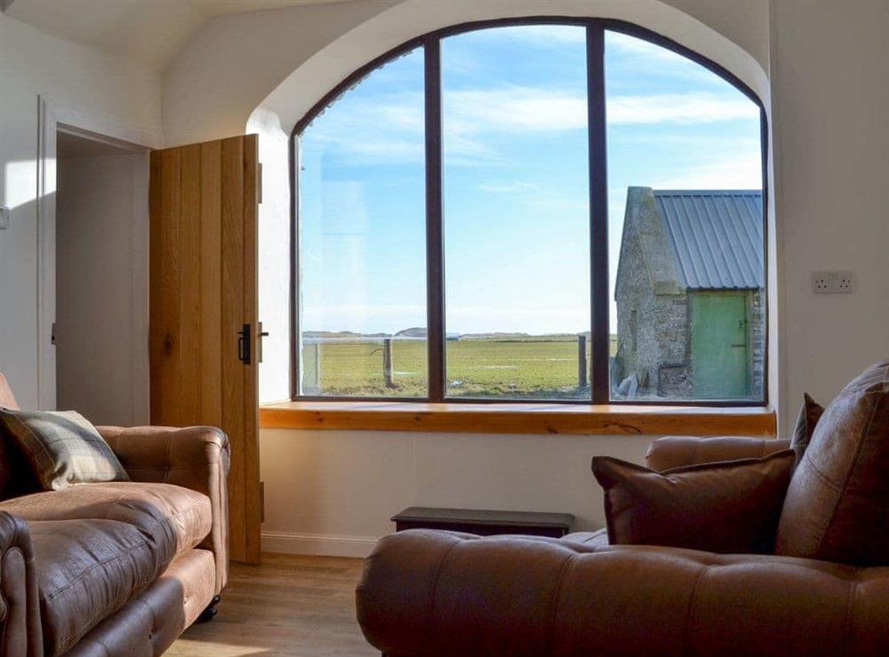 Light and airy living room at Cata Sand Cottage in Sanday, Orkney, Isle Of Orkney