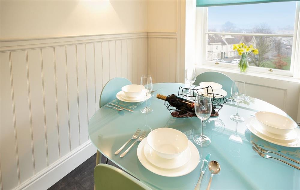Stylish and bright dining area for four guests at Catharine Place, Bath