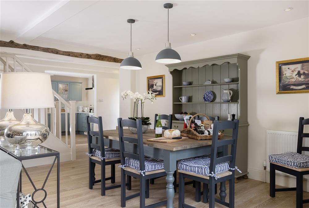 Ground floor: Dining area with seating for six guests at Cats Abbey Cottage, Northleach