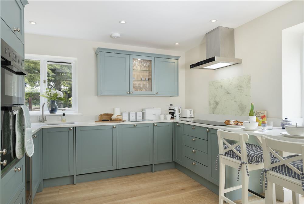 Ground floor: Well-equipped and stylish kitchen at Cats Abbey Cottage, Northleach