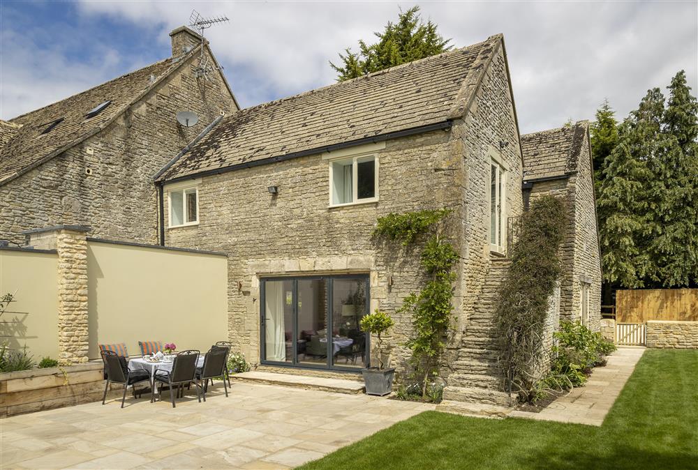 South facing rear walled garden with large terrace and garden furniture  at Cats Abbey Cottage, Northleach