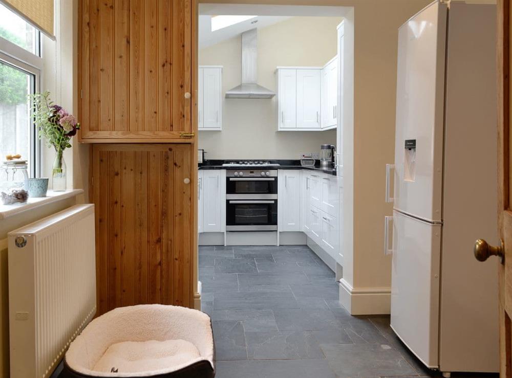 Useful utility area and kitchen at Cats Cottage in Kessingland, near Lowestoft, Suffolk