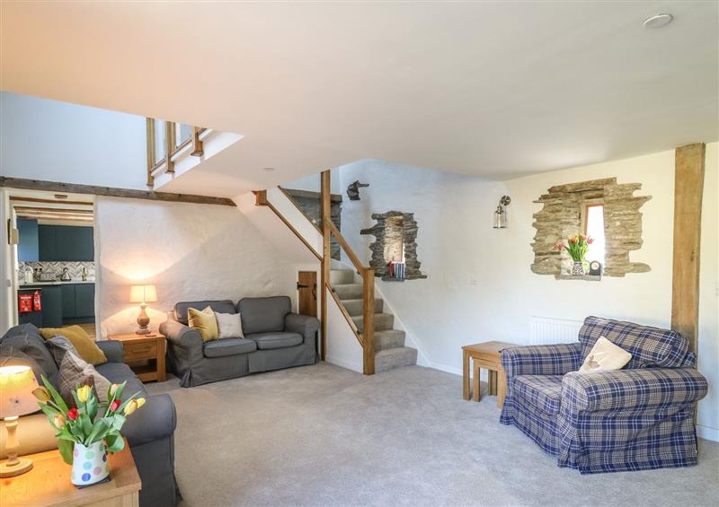 Relax in the living area at Cattle Tree Cottage, Llangoedmor near Cardigan