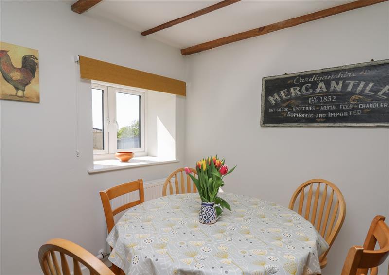 The dining area at Cattle Tree Cottage, Llangoedmor near Cardigan