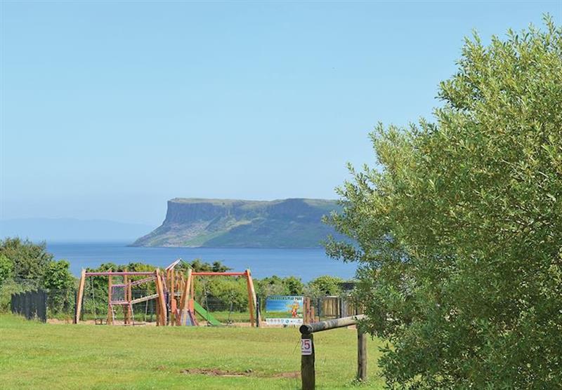 The playground and sea views at Causeway Coast Holiday Park in Ballycastle, Northern Ireland