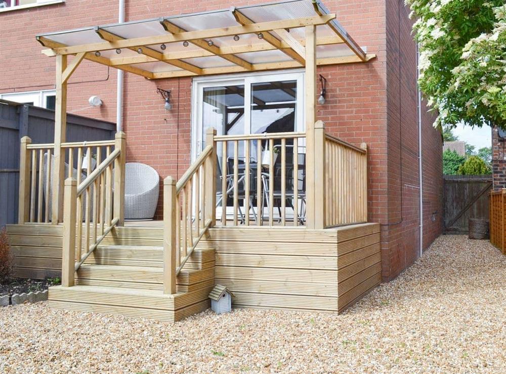 Charming holiday home with decked terrace at Cayton Cottage in Cayton, near Scarborough, Yorkshire, North Yorkshire