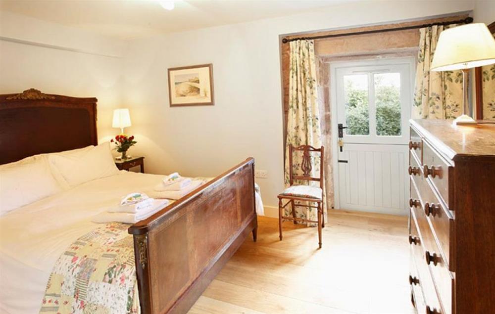 Double bedroom with 5’ bed and an en-suite bathroom with a separate power shower at Cazenovia Hall and Wythburn Cottage, near Greystoke