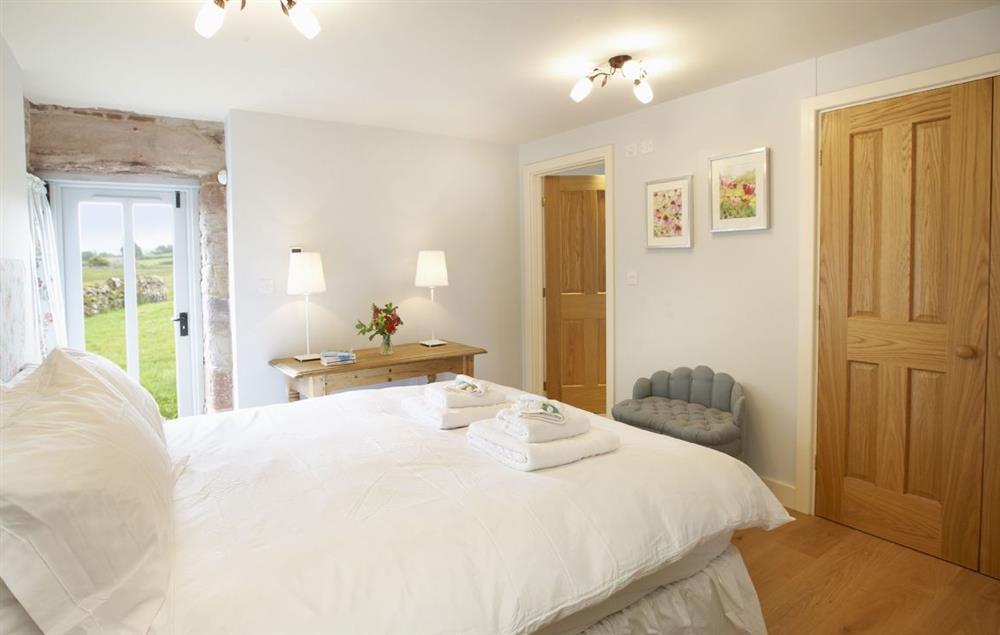 Double bedroom with 5’ bed which has en-suite shower room at Cazenovia Hall and Wythburn Cottage, near Greystoke