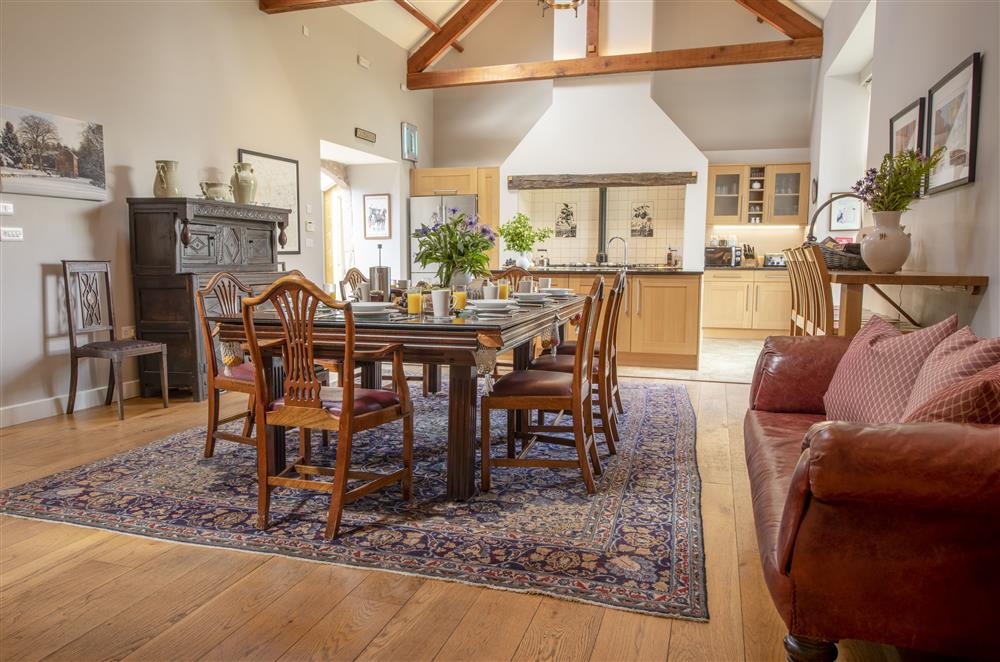 Open-plan kitchen and oak floored dining hall at Cazenovia Hall and Wythburn Cottage, near Greystoke