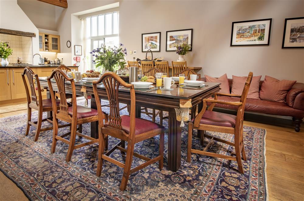 Unique dining table seating eight guests at Cazenovia Hall and Wythburn Cottage, near Greystoke