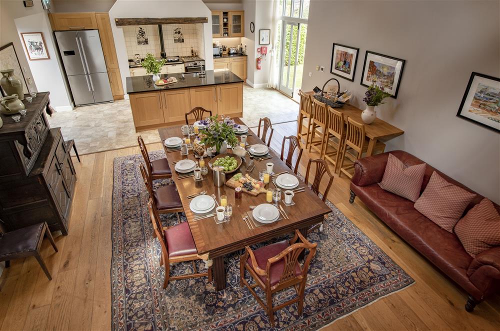 View of the open-plan kitchen and dining hall from the first floor at Cazenovia Hall and Wythburn Cottage, near Greystoke