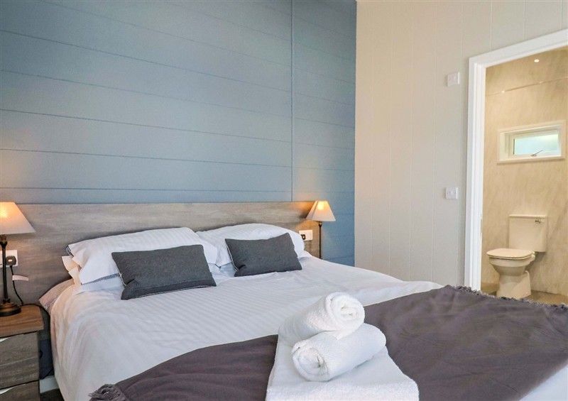 This is a bedroom (photo 3) at Cedar 1, Pinewood Retreat in Rousdon near Lyme Regis