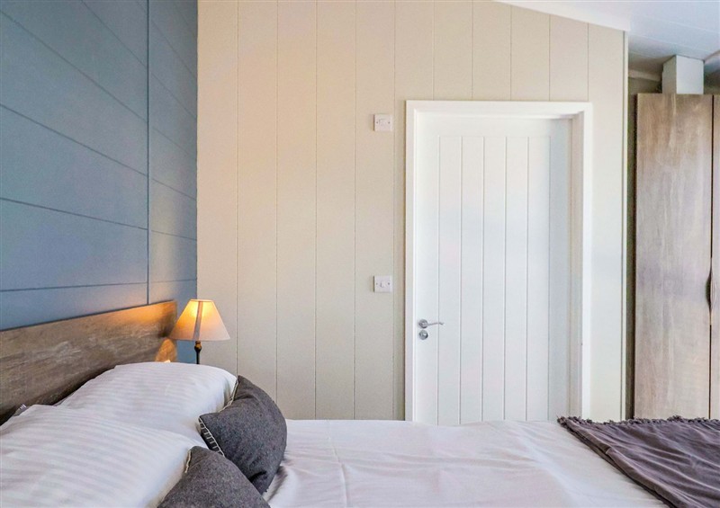 This is a bedroom at Cedar 1, Pinewood Retreat in Rousdon near Lyme Regis