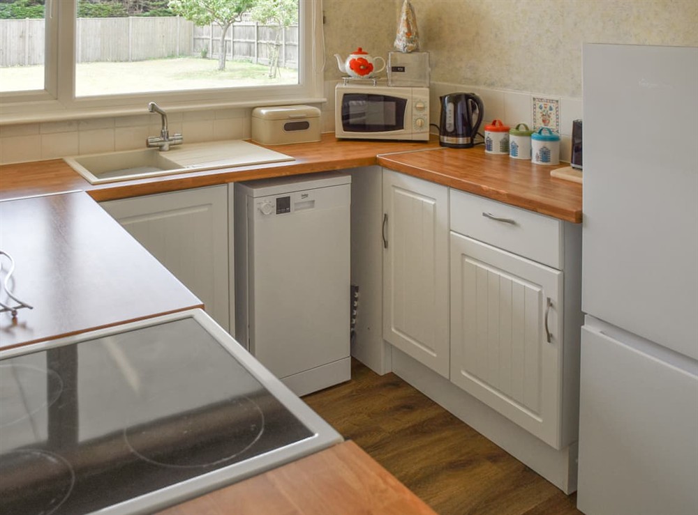 Kitchen (photo 2) at Cedar Bungalow in Bacton, Norfolk