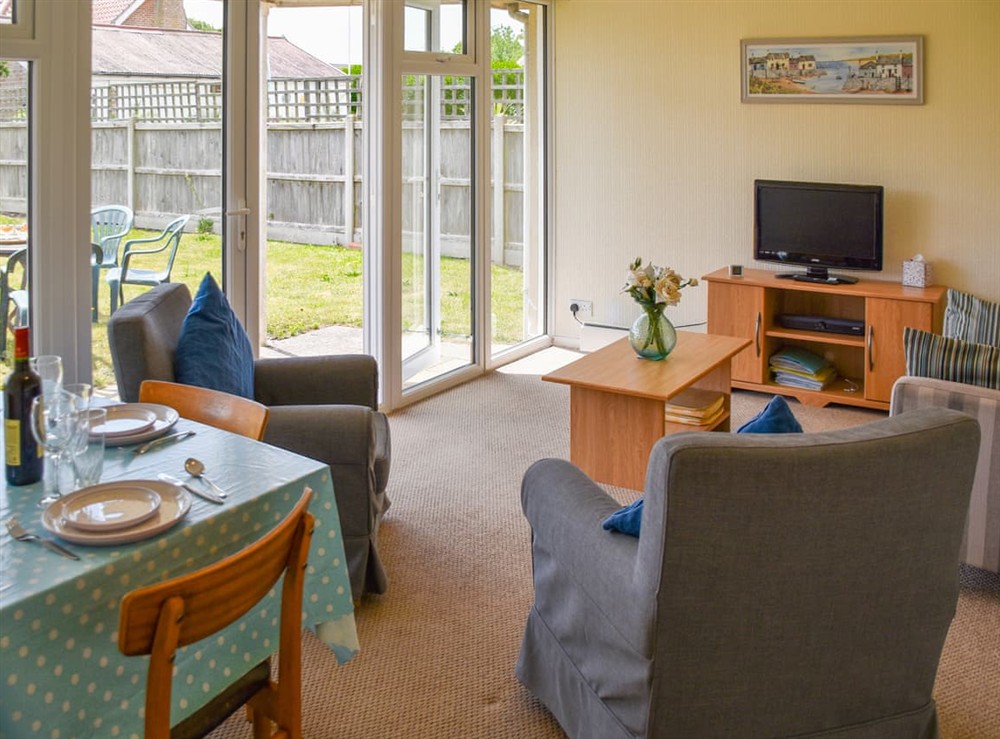 Open plan living space (photo 4) at Cedar Bungalow in Bacton, Norfolk