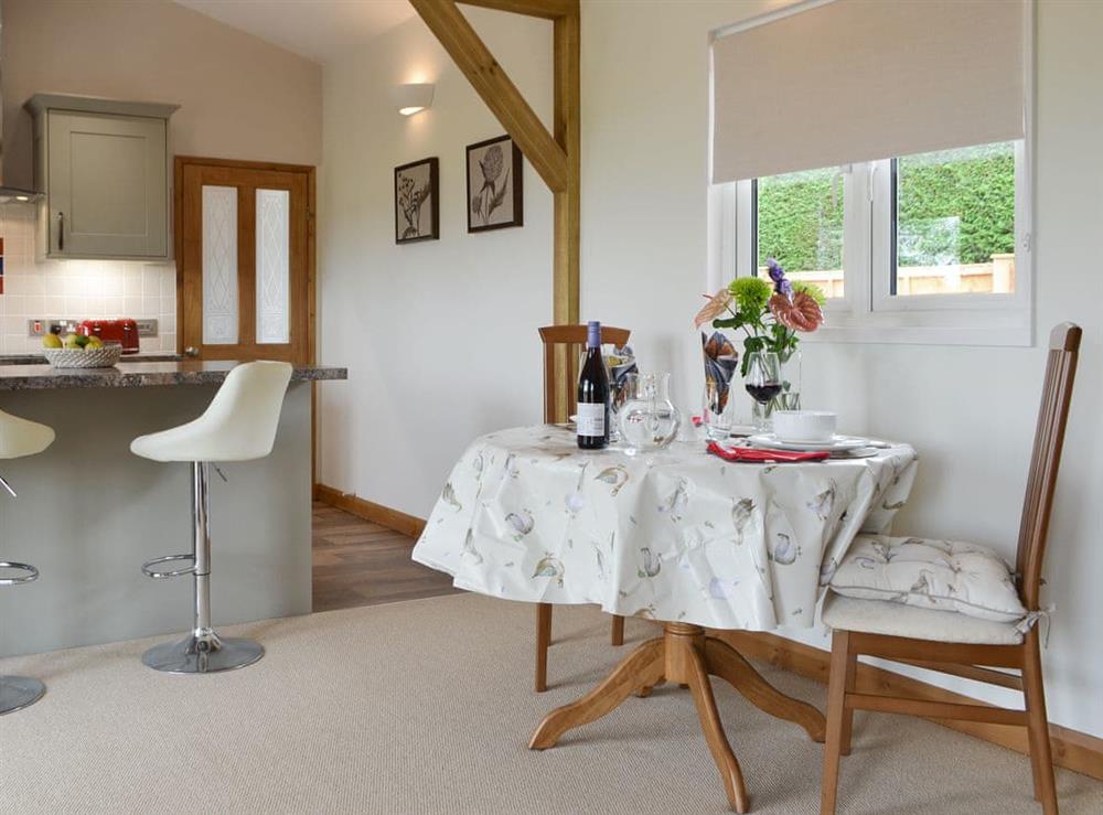 Convenient dining area at Cedar Lodge in Cowbeech, near Hailsham, East Sussex