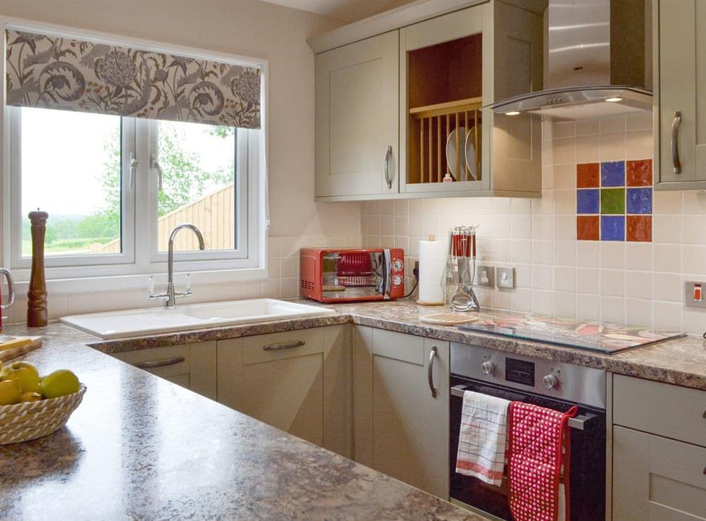 Fully-appointed fitted kitchen at Cedar Lodge in Cowbeech, near Hailsham, East Sussex