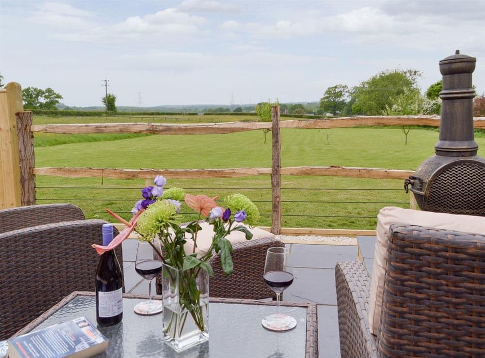 Wonderful rural view from the patio at Cedar Lodge in Cowbeech, near Hailsham, East Sussex