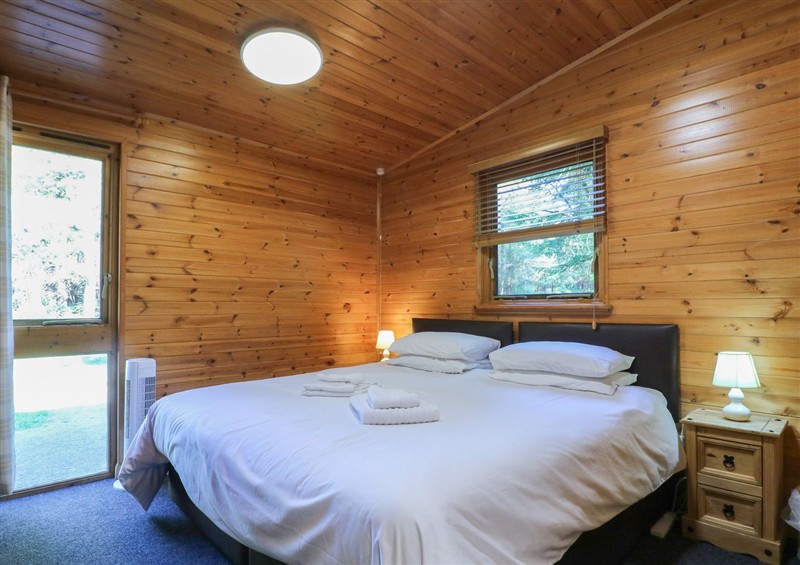 A bedroom in Cedar Lodge at Cedar Lodge, Rosliston