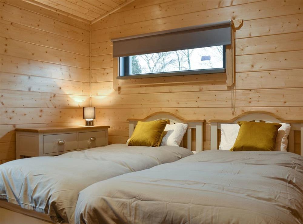 Comfortable twin bedroom at Cedar Lodge in Ulverston, Cumbria