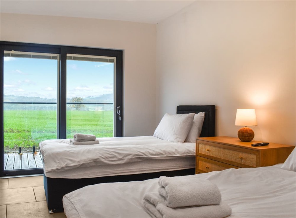 Twin bedroom (photo 3) at Cedar Lodge in Walton Presteigne, Powys