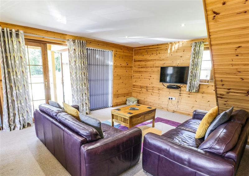 Relax in the living area at Cedar Wood, Llanbedr