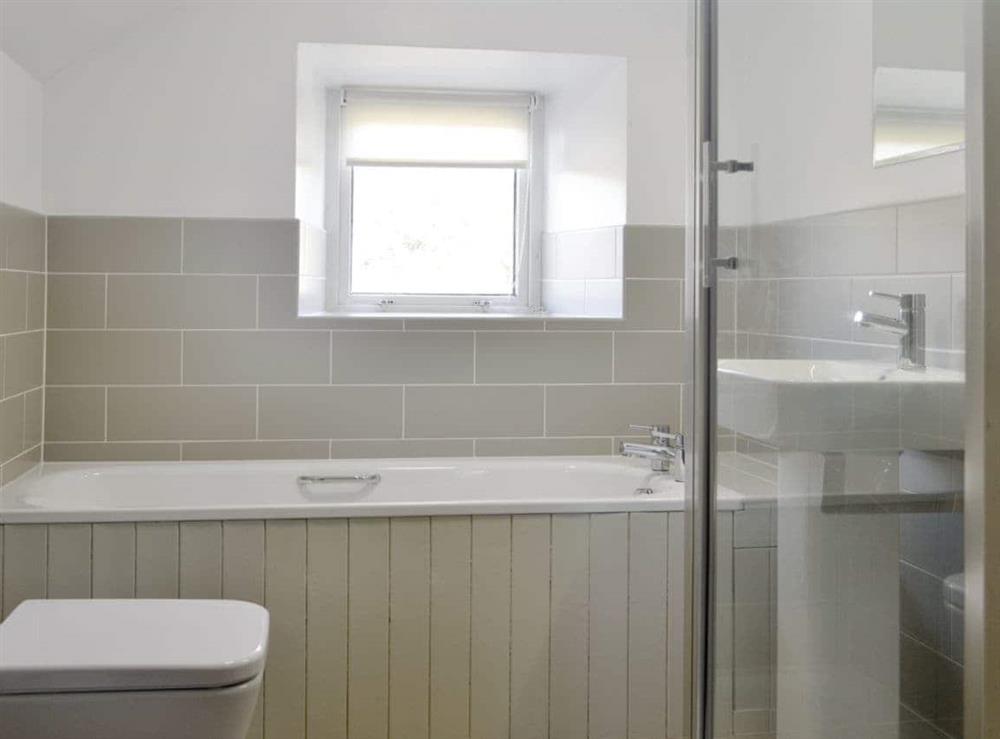 Family bathroom with separate shower cubicle, bath and heated towel rail at Cefn Bach in Nr Betws-y-Coed, Gwynedd., Great Britain
