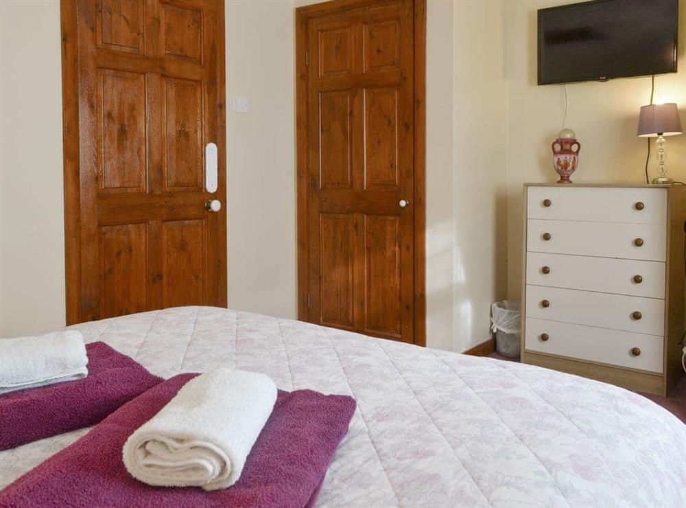 Peaceful double bedroom at Cefn Helyg Bach in Cemaes Bay, Gwynedd