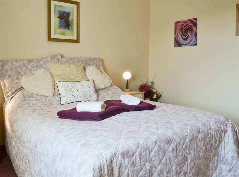 Relaxing double bedroom at Cefn Helyg Bach in Cemaes Bay, Gwynedd
