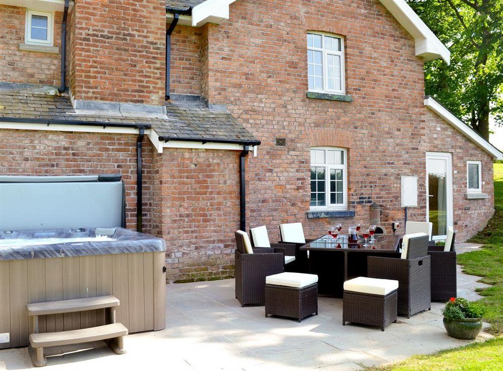 Fantasic outside seating area with hot tub at Cefnaire in Newtown, Powys
