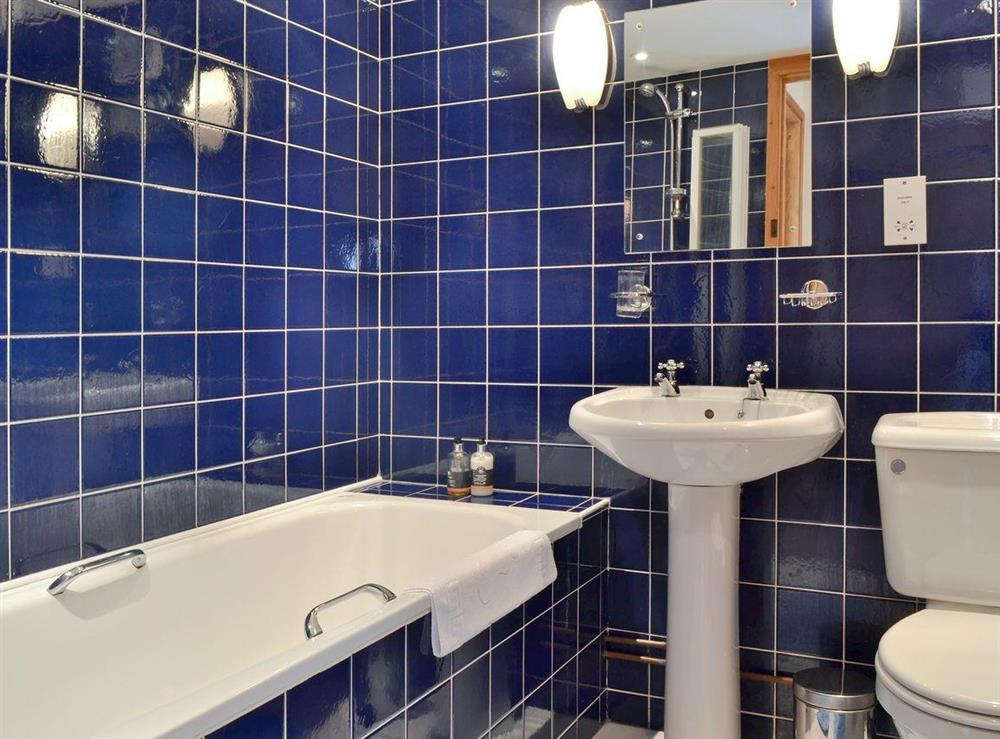 Fully-tiled bathroom at Cennen Cottages at Blaenllynnant, Y Bwthyn in Gwynfe, Llangadog, Carmarthenshire., Dyfed