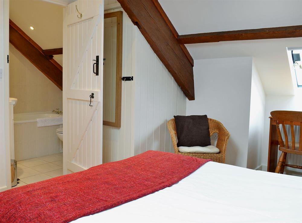 Double bedroom with fully tiled en-suite bathroom at Long House, 