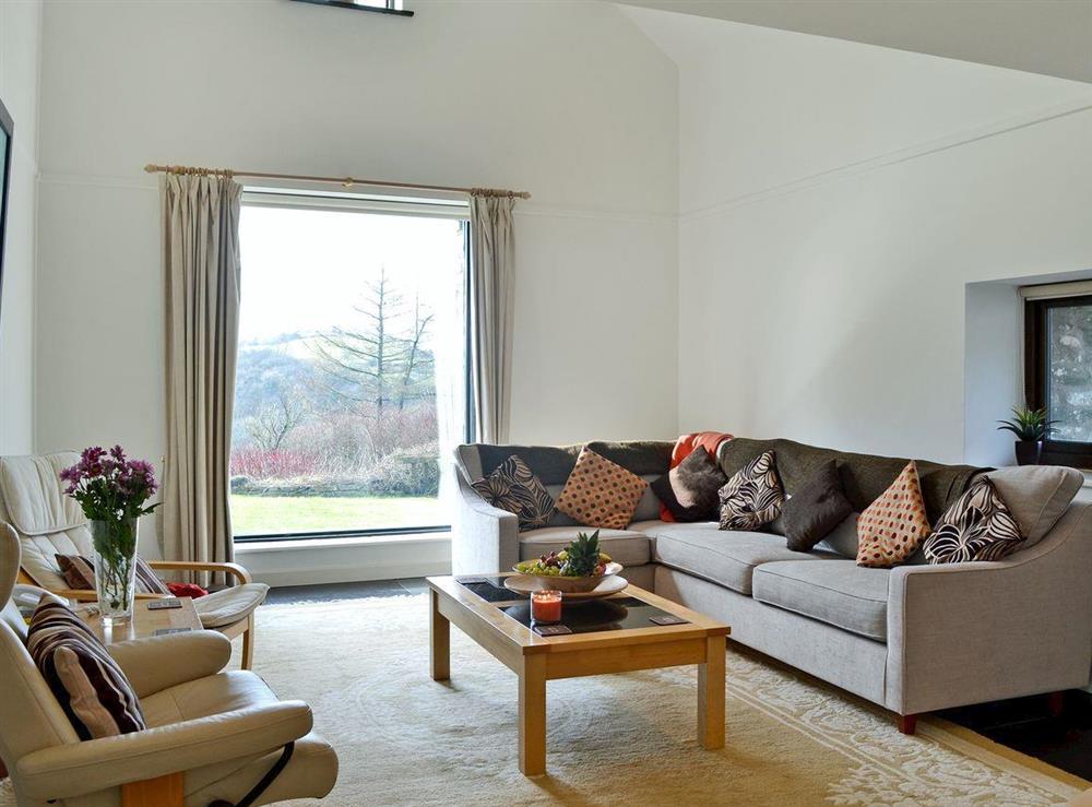 Living room boasting panoramic views at Long House, 