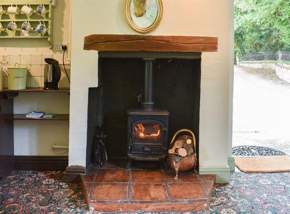 Lovely open hearth and woodburner at Cerne Abbey Cottage in Cerne Abbas, Dorset., Great Britain