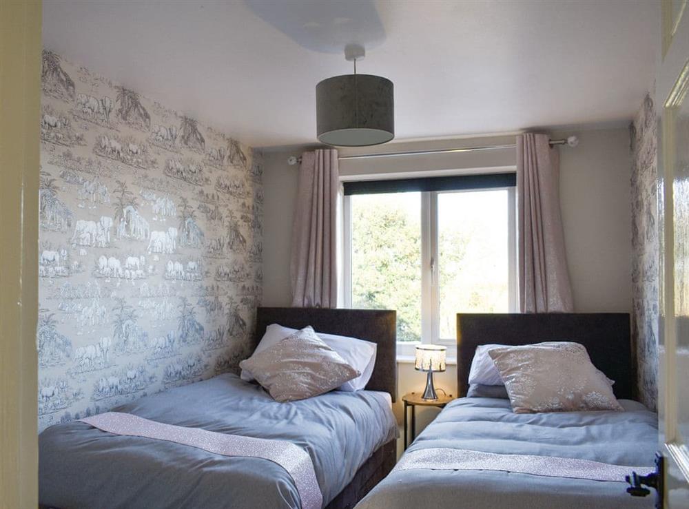 Twin bedroom at Cernunnos Cottage in Leven, North Humberside