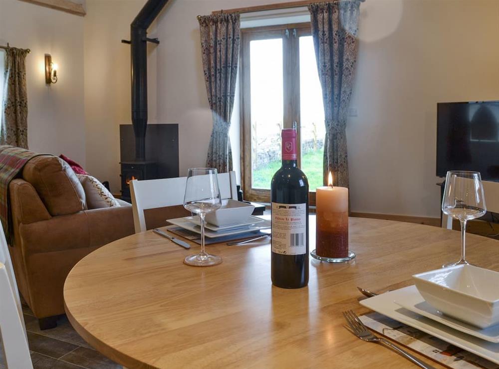 Intimate dining area at Curlew Cottage, 