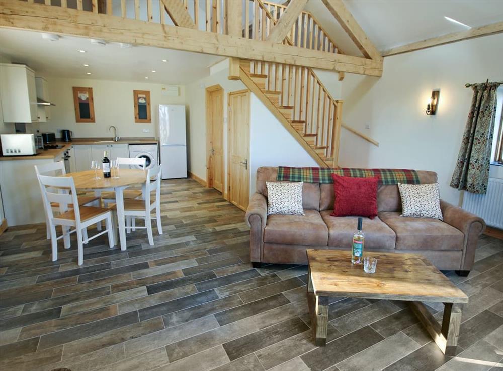 Spacious open plan living space at Curlew Cottage, 