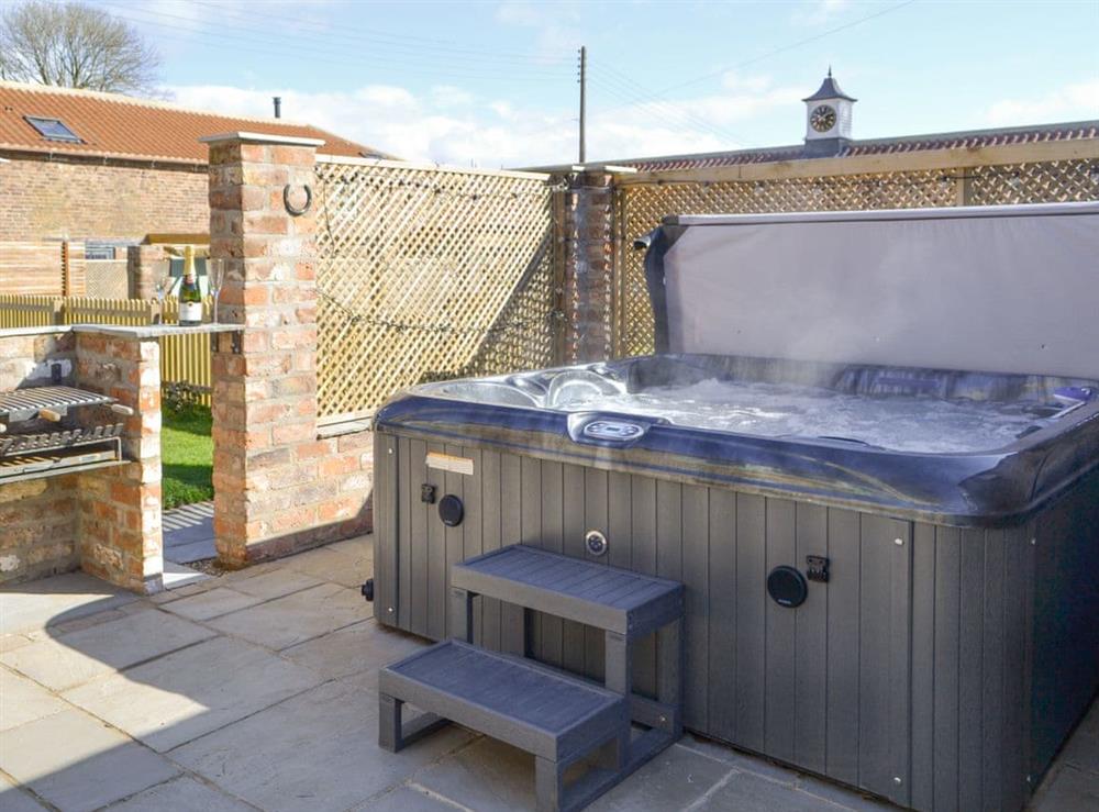 Hot tub at The Stables, 