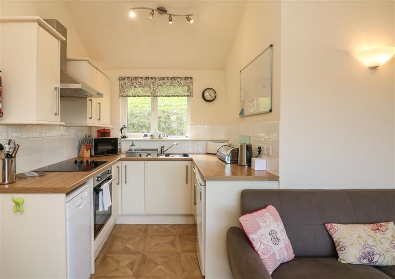 This is the kitchen at Chalet Log Cabin L10, Combe Martin