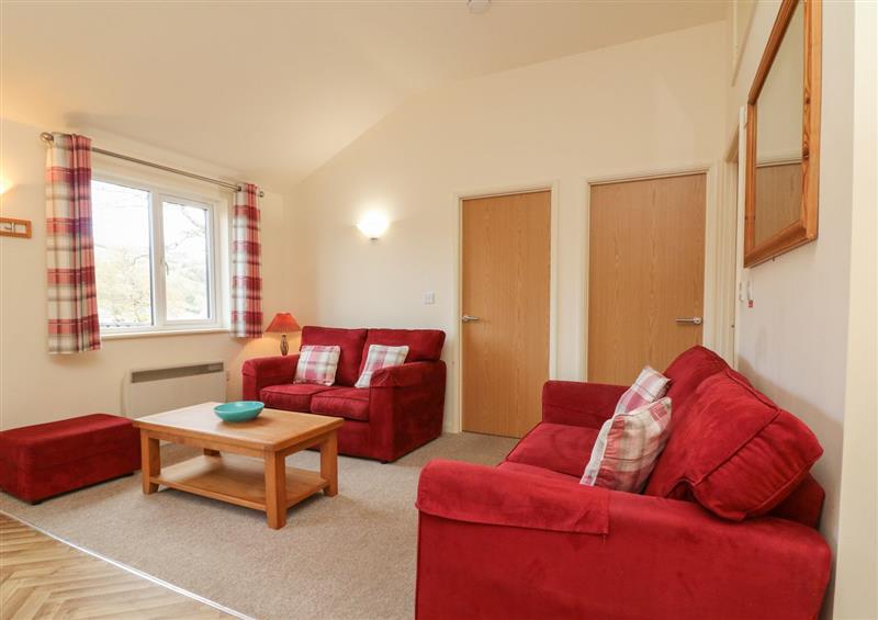 This is the living room at Chalet Log Cabin L2, Combe Martin