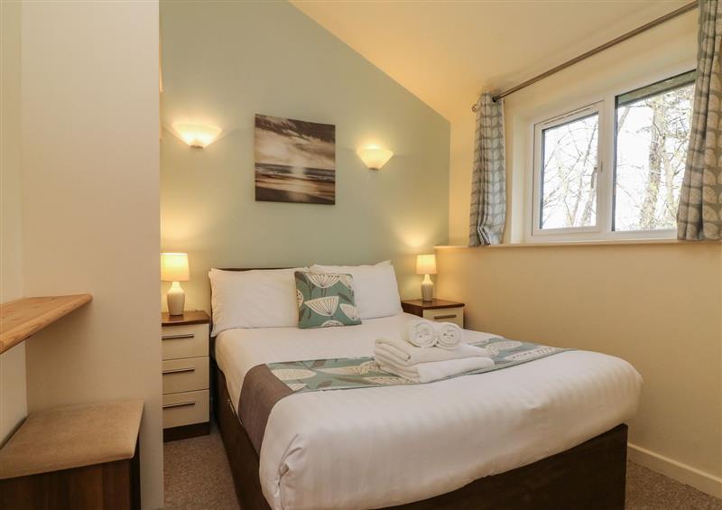One of the 2 bedrooms at Chalet Log Cabin L6, Combe Martin