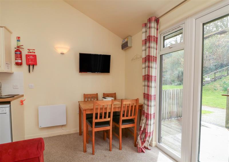 Relax in the living area at Chalet Log Cabin L7, Combe Martin