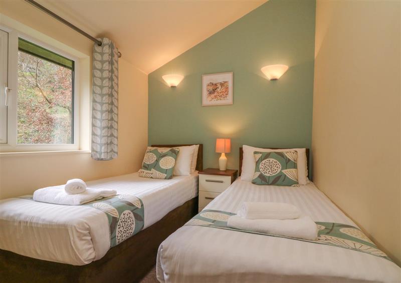 This is a bedroom at Chalet Log Cabin L7, Combe Martin